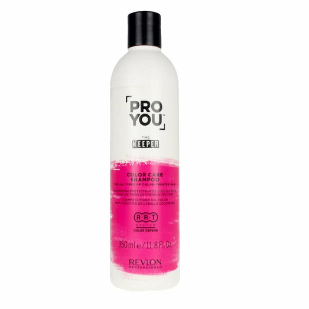 Weiße Flasche mit schwarzem Deckel. Aufschrift: PRO YOU THE KEEPER COLOR CARE SHAMPOO. Rosa Farbband. 350ml/11.8 FL.OZ. REVON PROFESSIONAL.