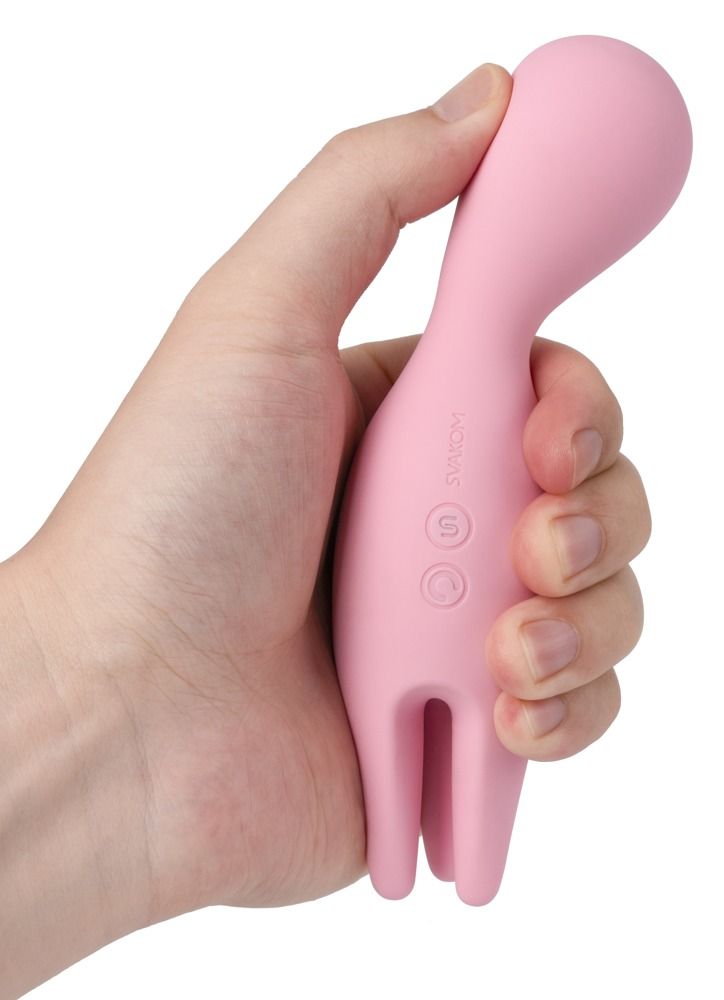 Rosa Vibrator in einer Hand gehalten. Abgerundeter Kopf, drei Finger, zwei Knöpfe.