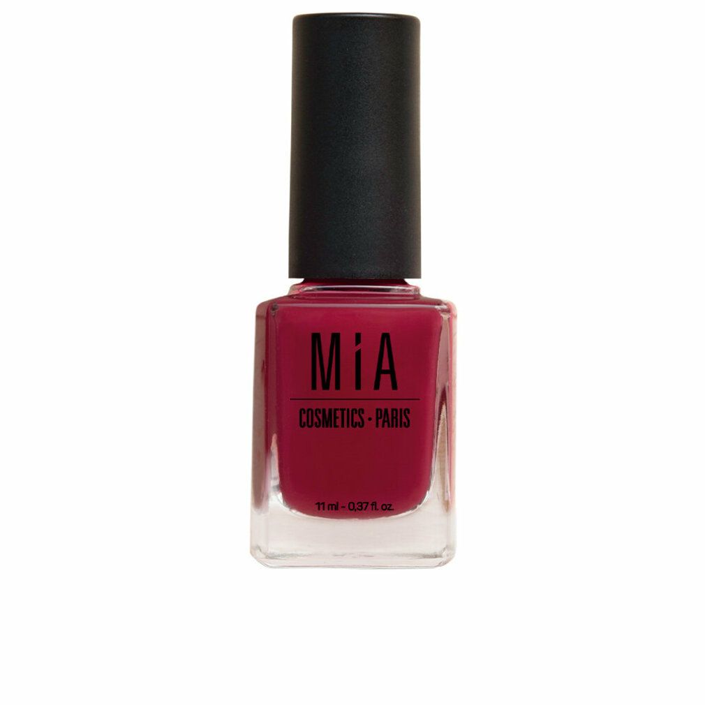 Nagellackflasche mit schwarzem Deckel. Aufschrift: MIA COSMETICS - PARIS. Farbe: Carmine.