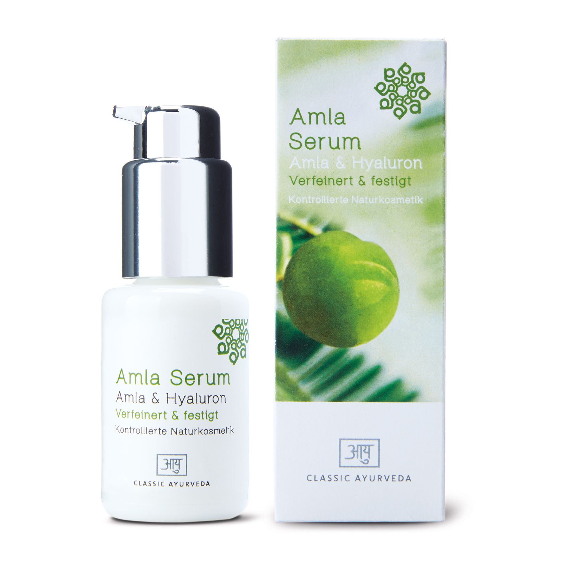 Weißes Serumfläschchen mit silbernem Pumpkopf und Karton. Beschriftung: Amla Serum, Classic Ayurveda.