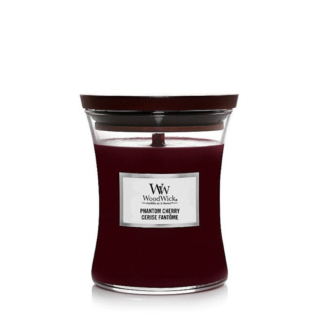 Rote Kerze im Glasbehälter mit Holzdeckel. Etikett mit "WoodWick" und "Phantom Cherry".