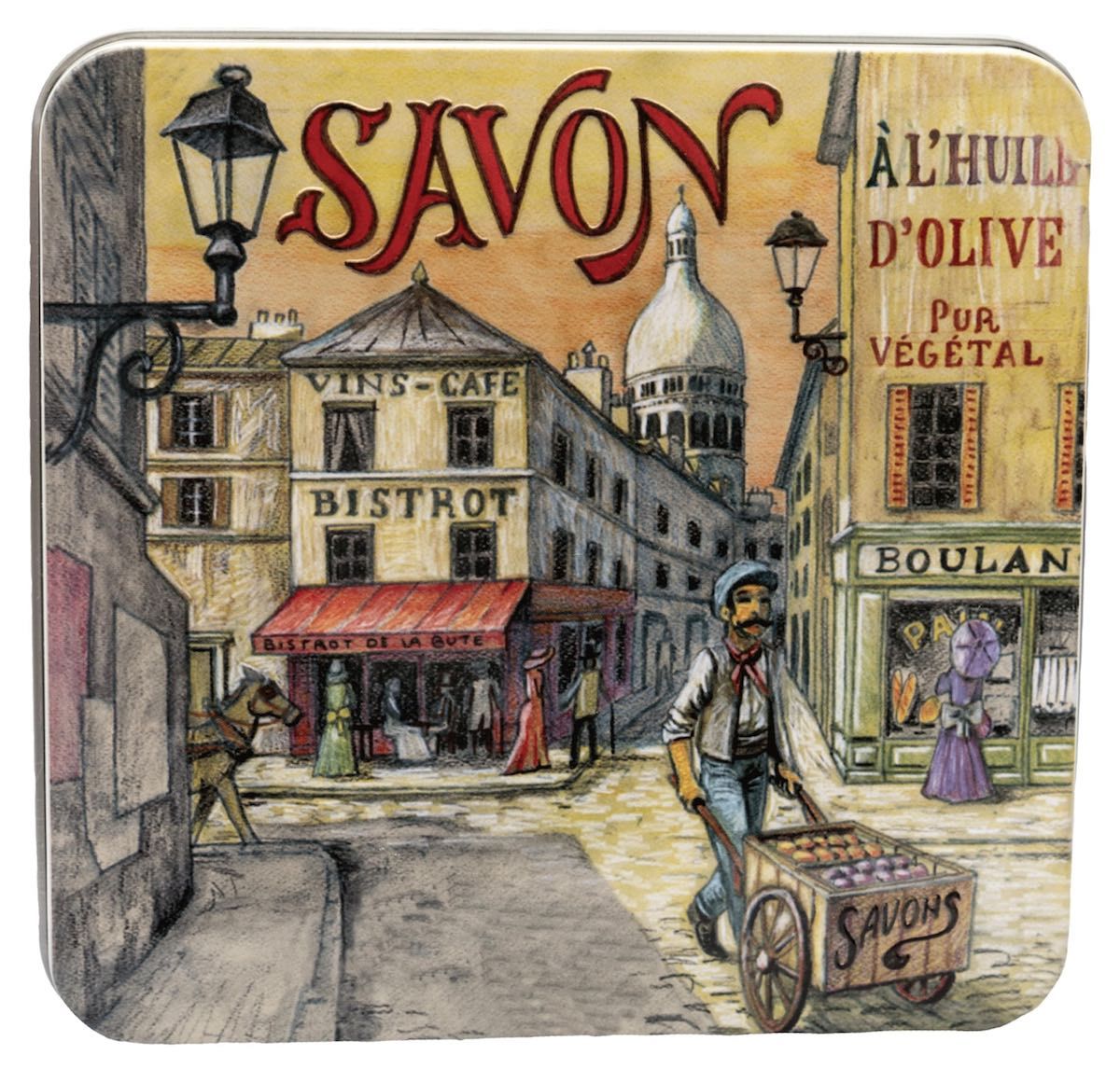 Quadratische Metallbox mit Illustration einer Straßenszene. Aufschrift "SAVON".