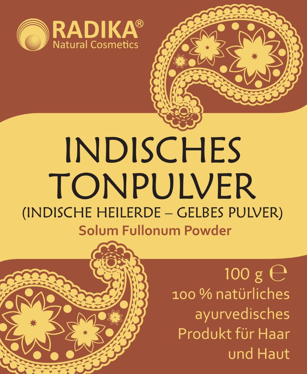 Braunes und gelbes Etikett mit Text: Indisches Tonpulver, Solum Fullonum. Marke: Radika Natural Cosmetics. 100 g. 100 % natürlich.