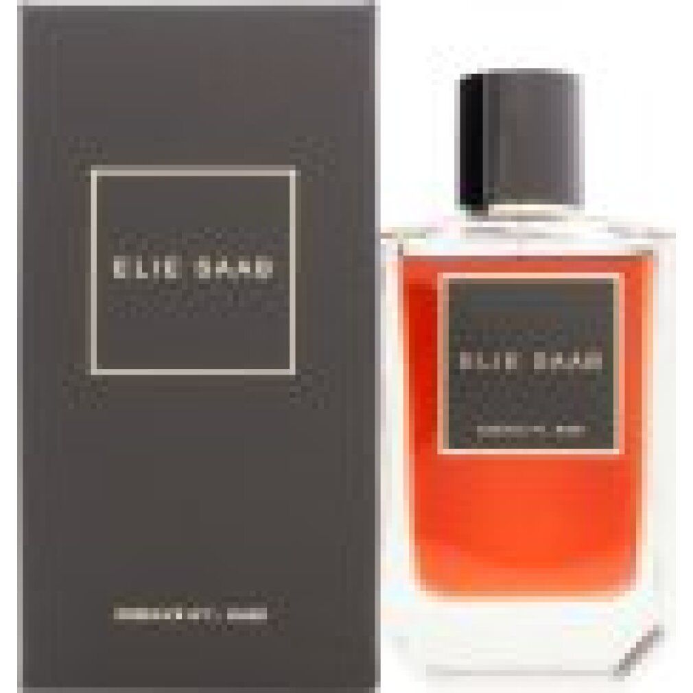 Parfümflakon neben rechteckiger Schachtel. Flakon mit roter Flüssigkeit, schwarzem Deckel und ELIE SAAB-Etikett.