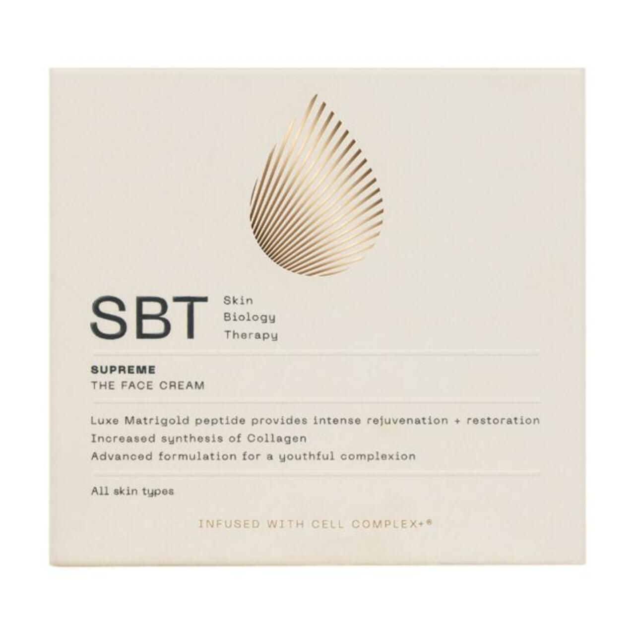 Produktverpackung. Aufschrift: SBT Skin Biology Therapy, THE FACE CREAM. Goldfarbenes Tropfen-Design. Text über Inhaltsstoffe.