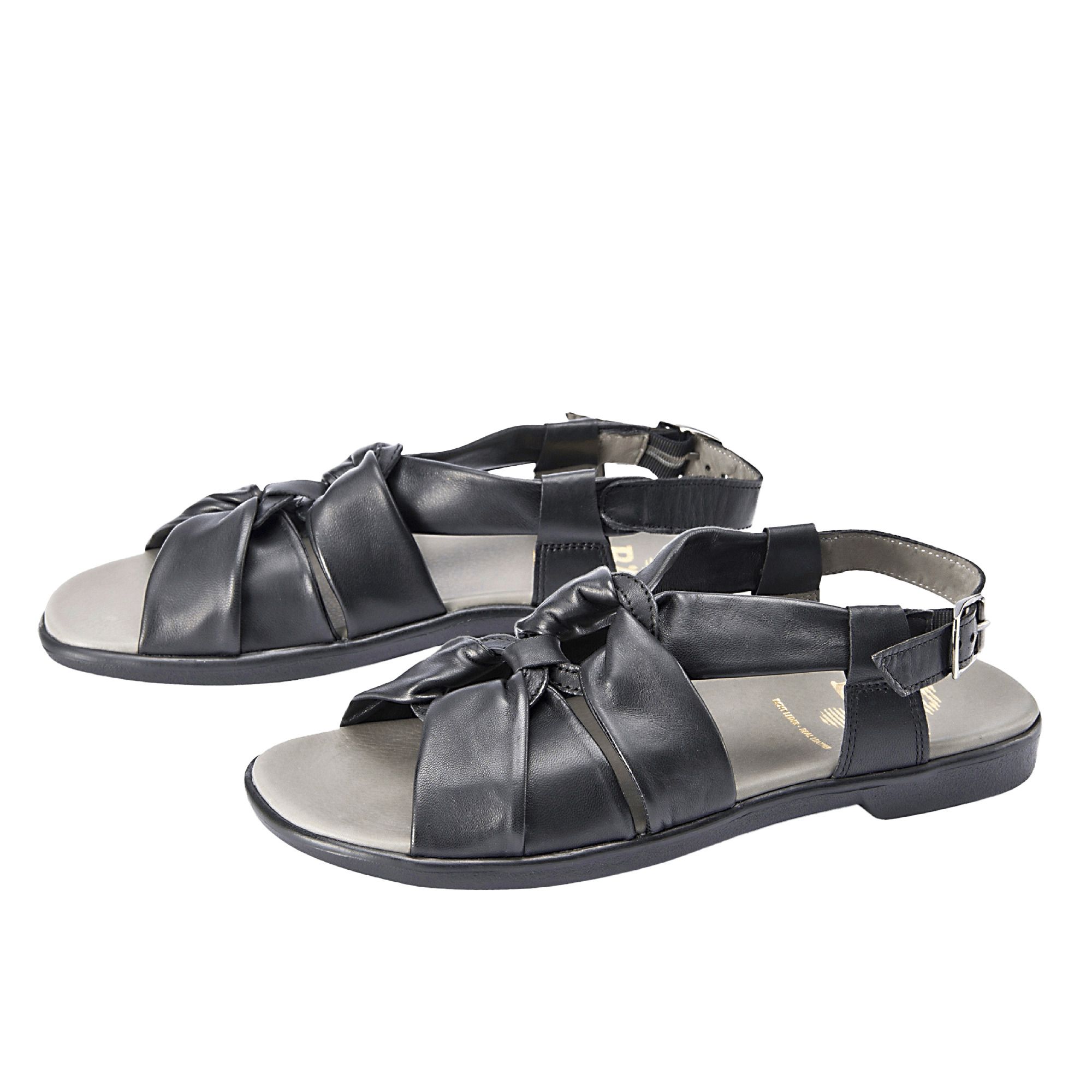 Schwarze Sandalen mit breiter Passform. Obermaterial mit Knoten-Design. Riemen mit Schnalle. Graue Innensohle.