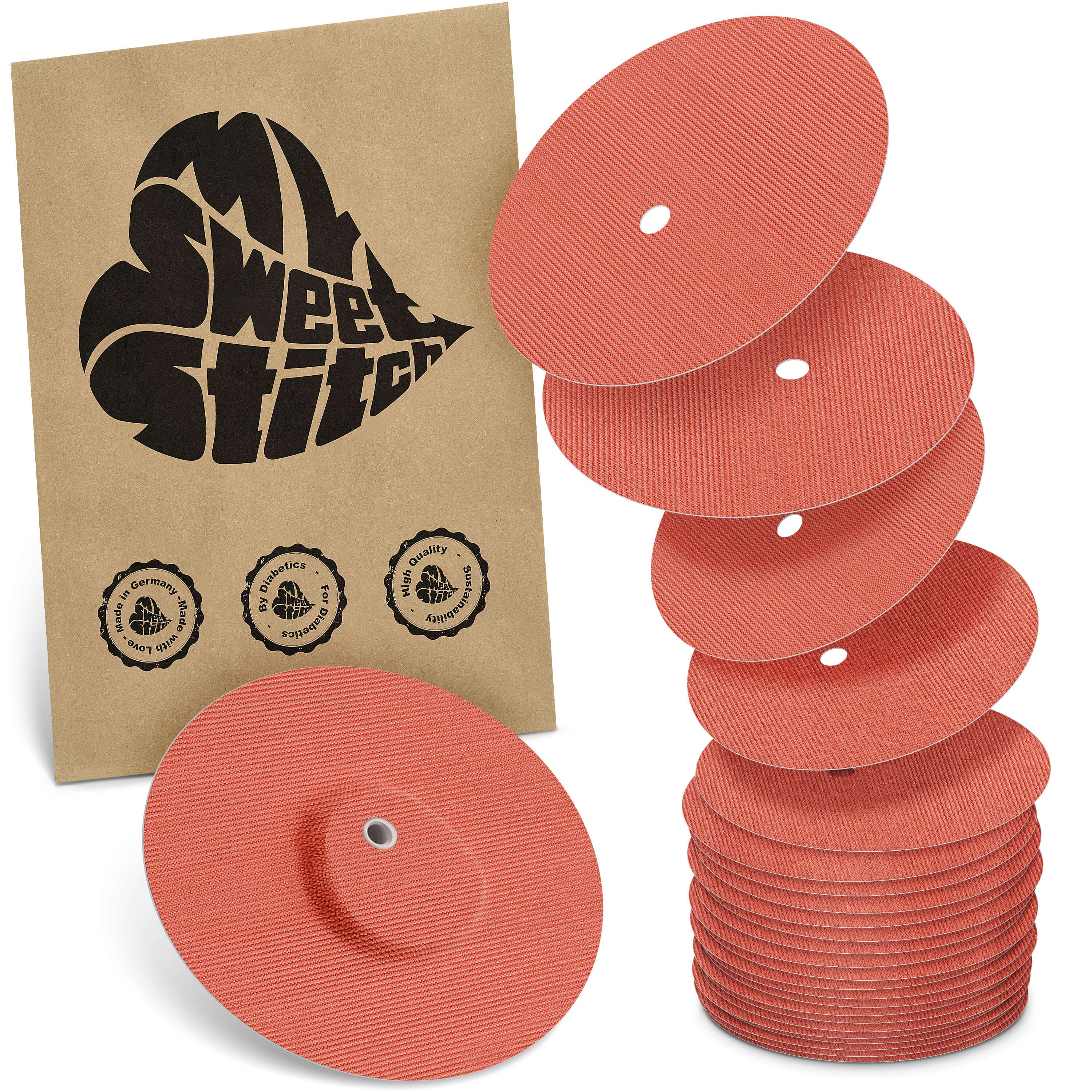 Fixierpflaster, rund, orange, mit Loch. Verpackung mit Logo MySweetStitch und Qualitätssiegeln. Stapel und einzelne Pflaster.