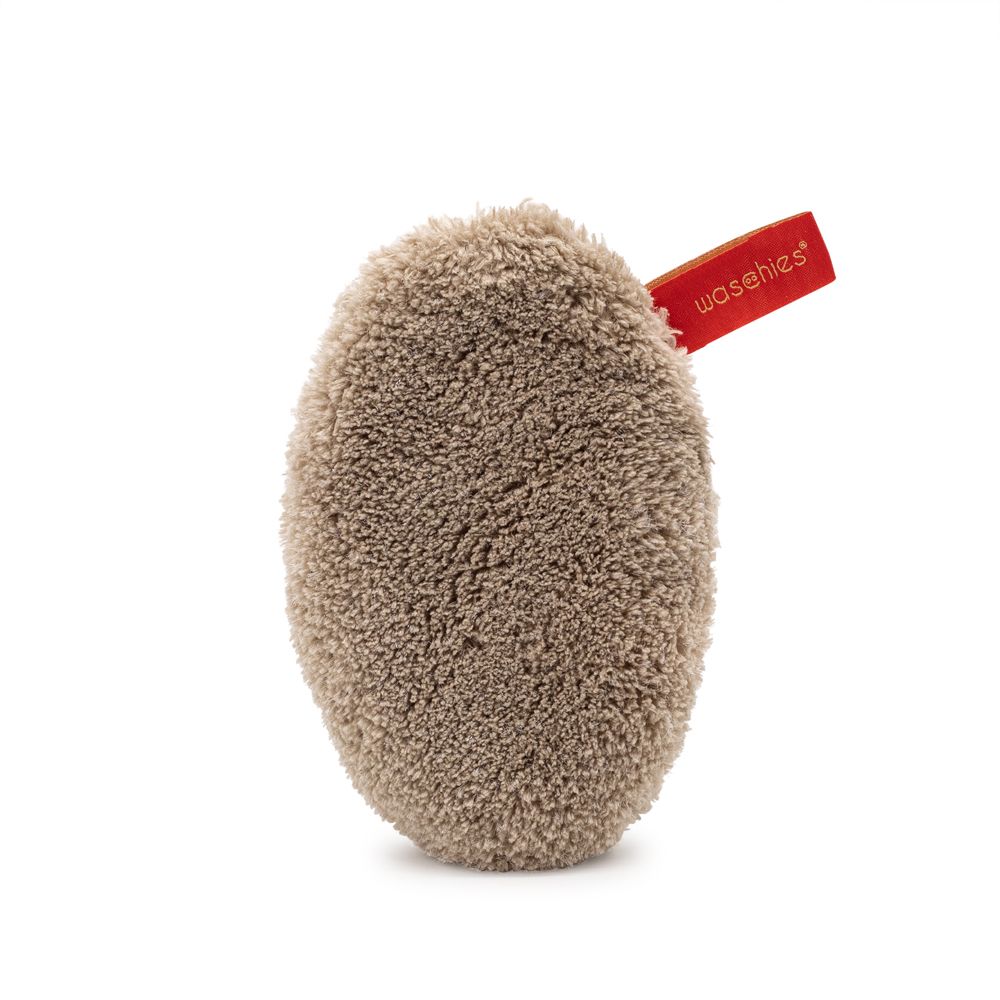 Beiges Abschminkpad mit rotem Label. Oval geformt, flauschig.