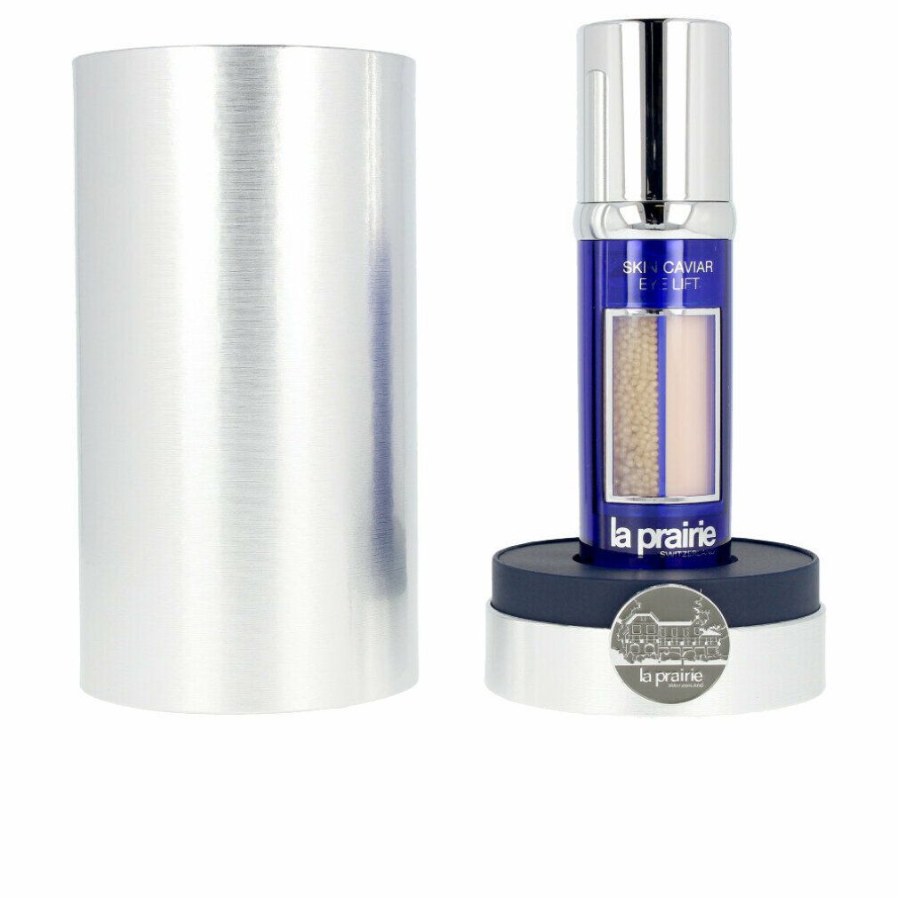 Blau-silberne Flasche mit Caviar-Kapseln. Aufschrift: Skin Caviar Eye Lift, La Prairie. In silberner Hülse und auf Sockel.
