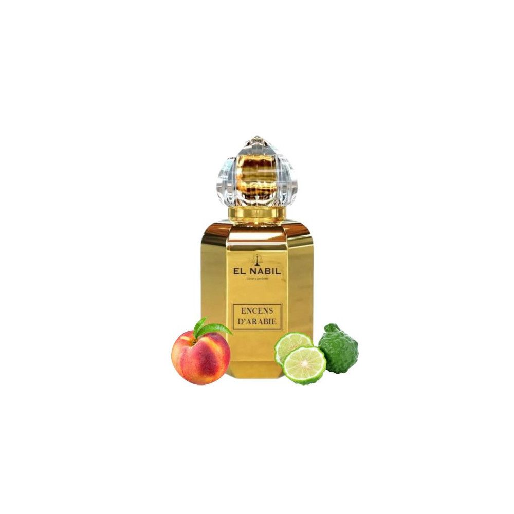 Goldfarbene Parfumflasche mit Kristallverschluss, neben Pfirsich, Limetten und Bergamotte.