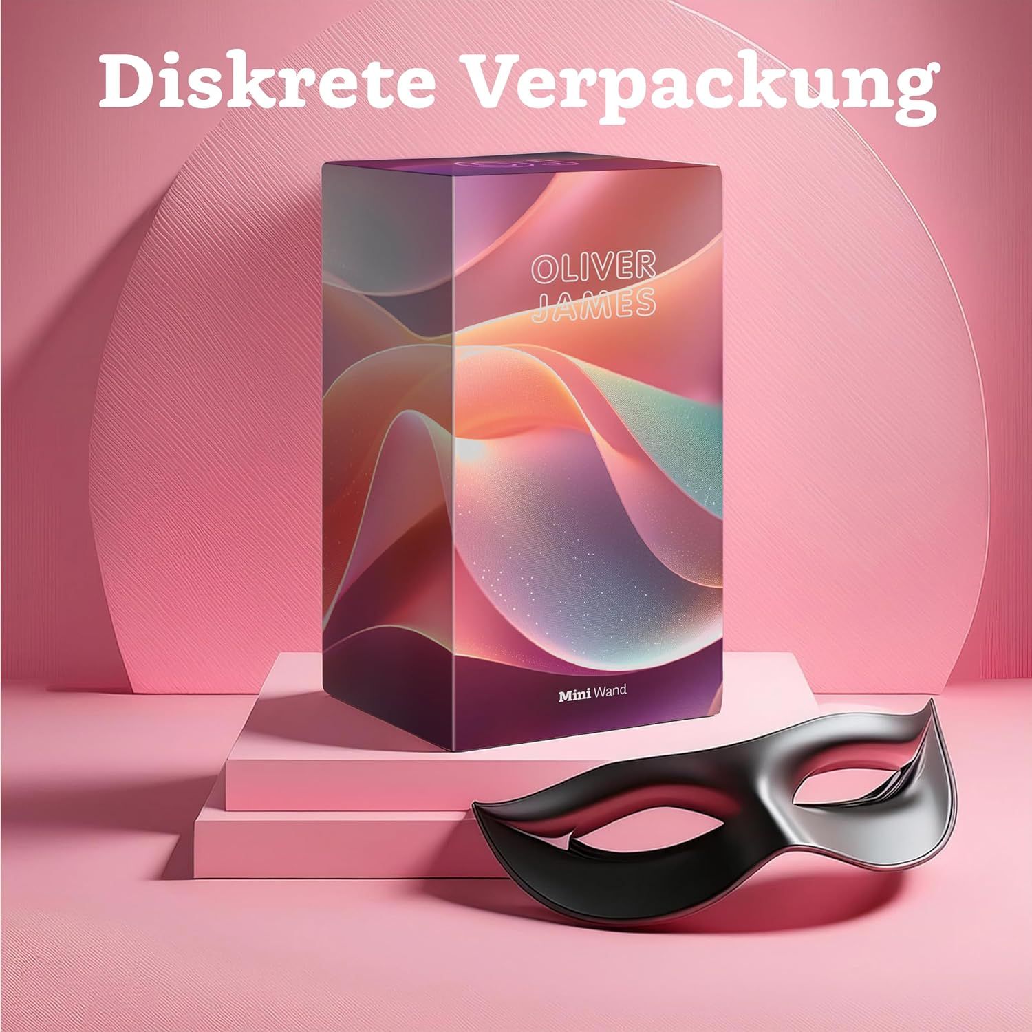 Oliver James Mini Wand-Verpackung und eine schwarze Maske auf rosa Podest.
