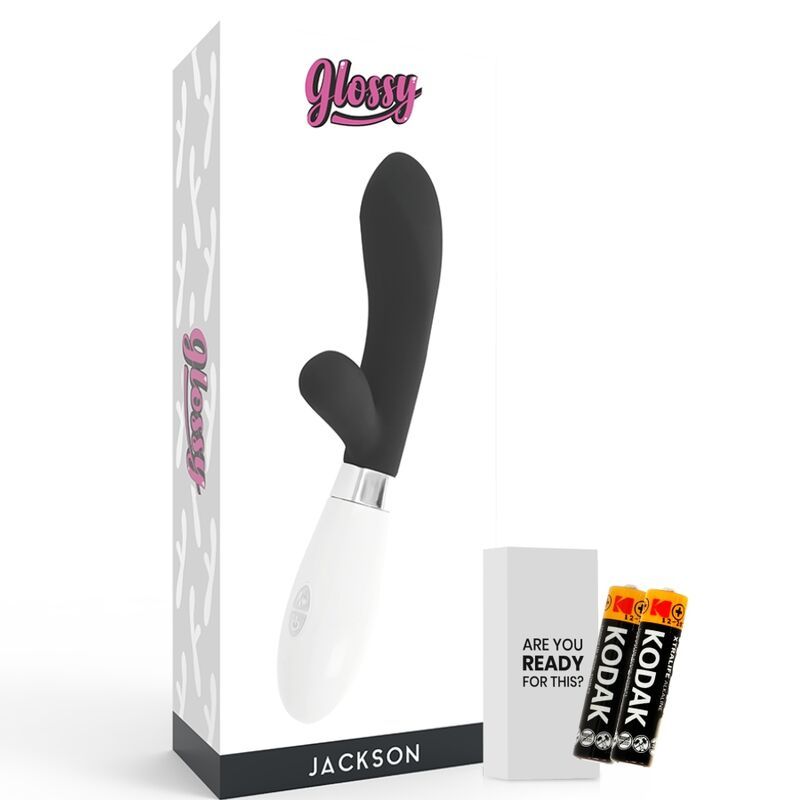 Produktverpackung mit Vibrator und Batterien. Der Vibrator ist schwarz-weiß. Auf der Verpackung steht "Glossy" und "Jackson".