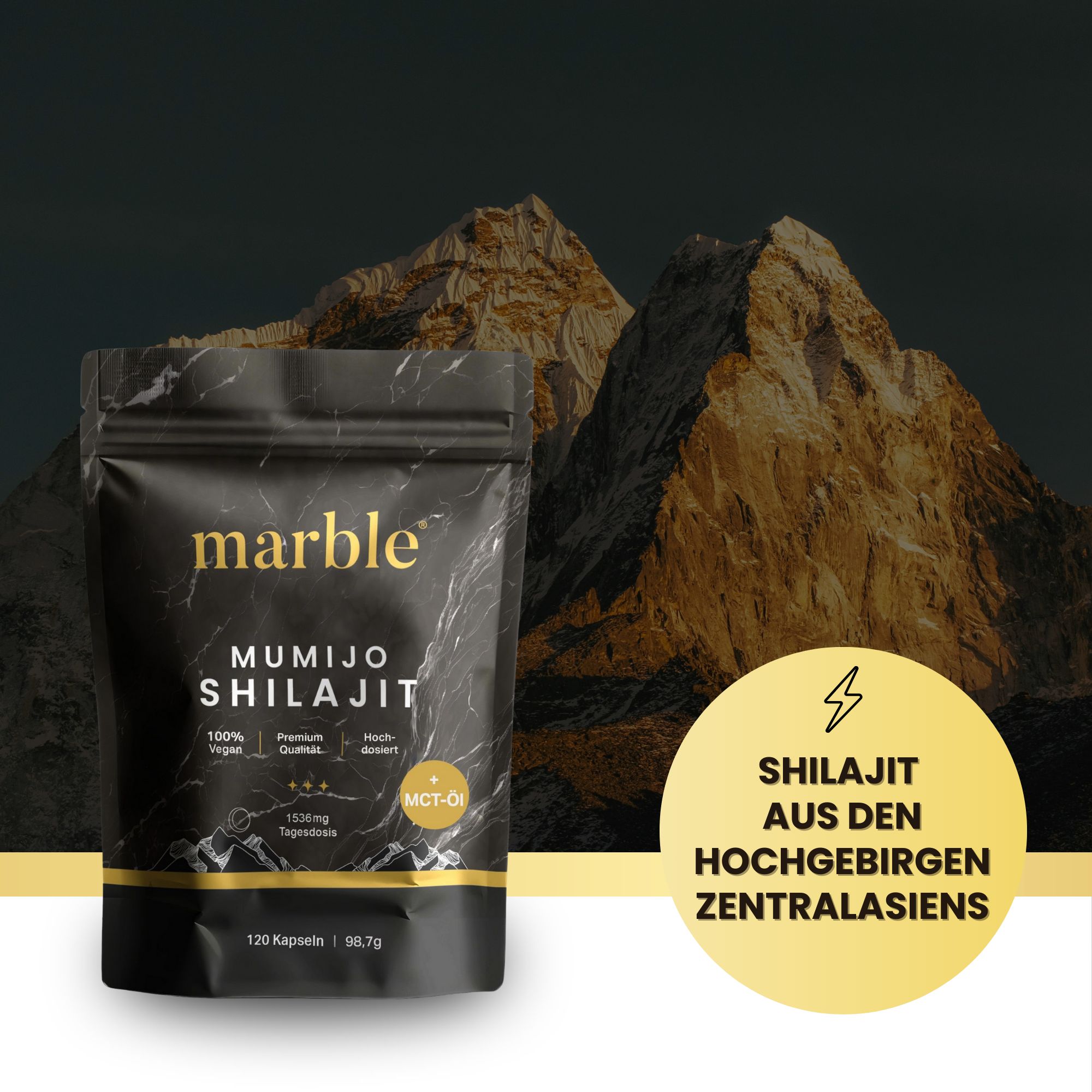 Schwarze Verpackung mit Logo: marble MUMIJO SHILAJIT. Text: 100% vegan, Premium Qualität, hochdosiert. Text: Shilajit aus den Hochgebirgen Zentralasiens. Hintergrund: Berglandschaft.