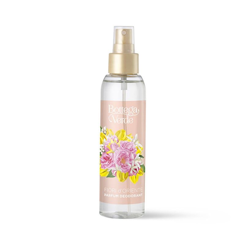 Bottega Verde Fiori d'Oriente profumo deodorante. Flacone spray trasparente con erogatore dorato. L'etichetta presenta un bouquet di fiori rosa, gialli e bianchi. Il nome del prodotto e del marchio sono stampati sull'etichetta.
