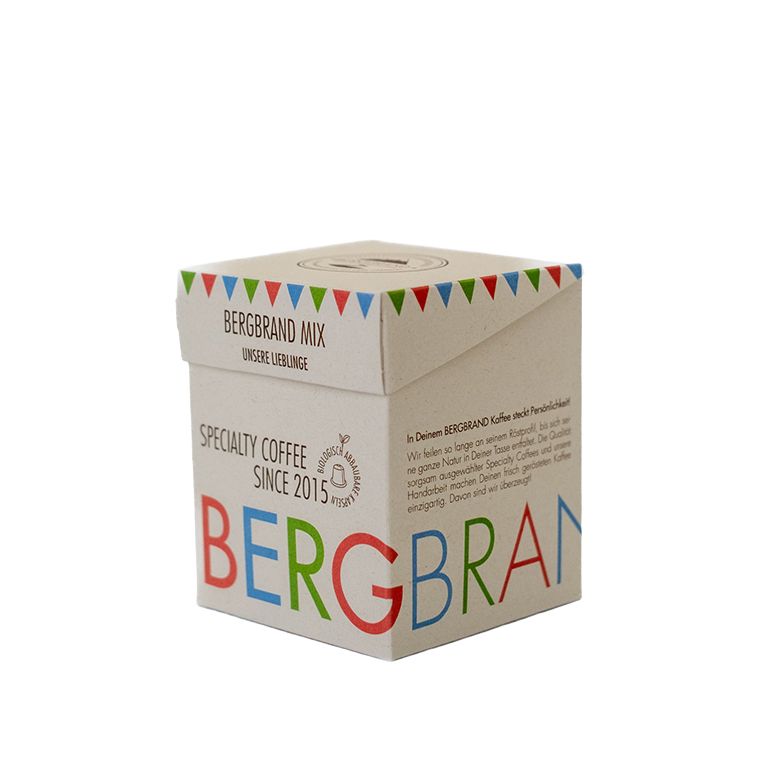Kapsel-Verpackung. Text: BERGBRAND MIX, Specialty Coffee, seit 2015. Mehrfarbiges Design.