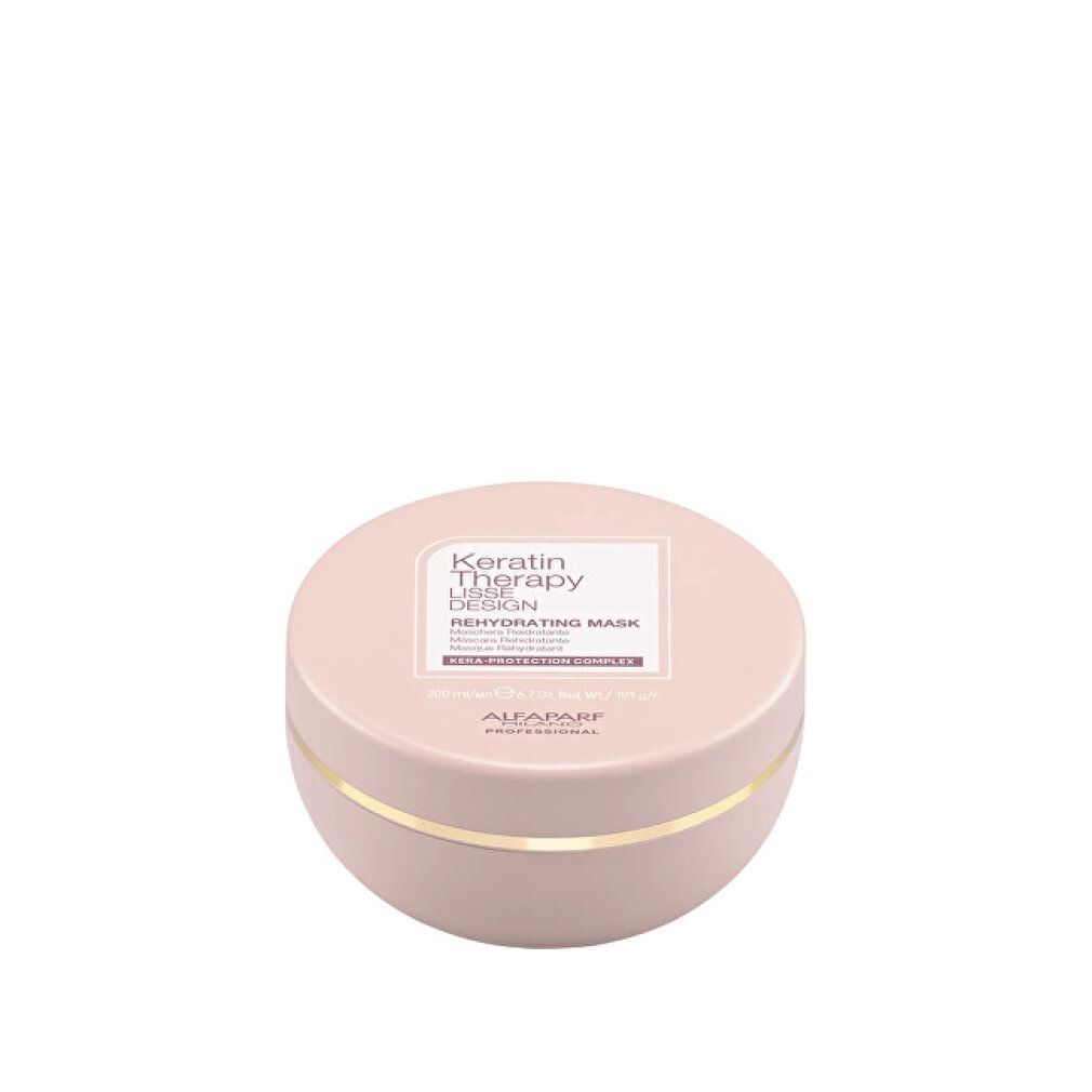 Runde, rosafarbene Dose mit Keratin Therapy Lisse Design Rehydrating Mask. Enthält KERA-PROTECTION COMPLEX.