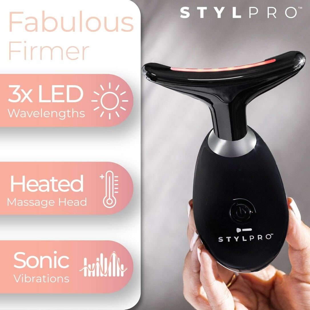 STYLPRO-Gerät mit Infografiken. Schwarzes Gerät mit silberfarbenem Kopf. 3x LED-Wellenlängen. Beheizter Massagekopf. Schallvibrationen.