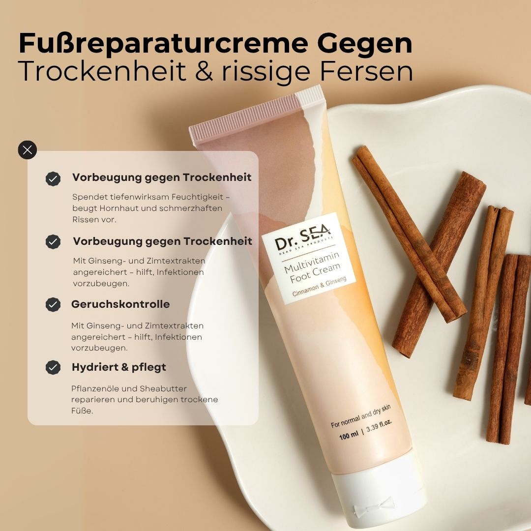 Tube Fußcreme, Dr. Sea, Multivitamin, Zimt & Ginseng, neben Zimtstangen. Text über Trockenheit und rissige Fersen.