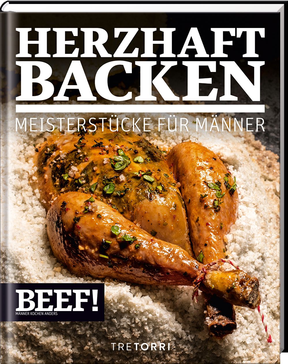 Kochbuch "HERZHAFT BACKEN" mit gebratenem Hähnchen. Titel und Logo "BEEF!". Aufschrift "MEISTERSTÜCKE FÜR MÄNNER". Verlag TRE TORRI.