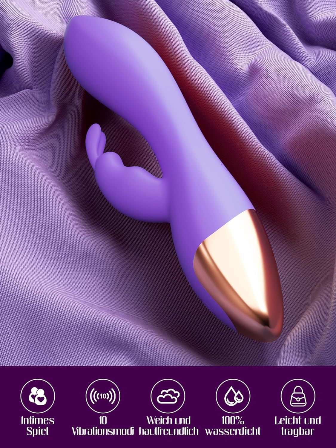 Lila Vibrator mit goldener Spitze auf lila Stoff, mit Symbolen für Hautfreundlichkeit und Wasserdichtigkeit.