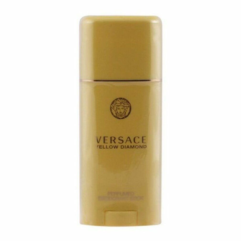 Gelber Deodorant-Stick von Versace Yellow Diamond. Goldfarbenes Logo und Schriftzug. Aufschrift: Perfumed Deodorant Stick.