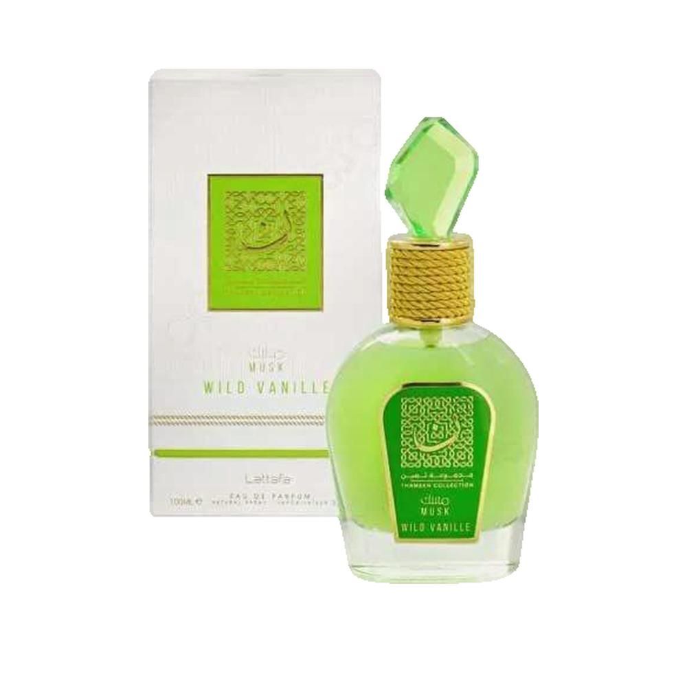 Grünes Parfümflakon mit goldener Kappe und grüner Kristallspitze. Weiße Verpackung mit grünem Logo und Schriftzug.