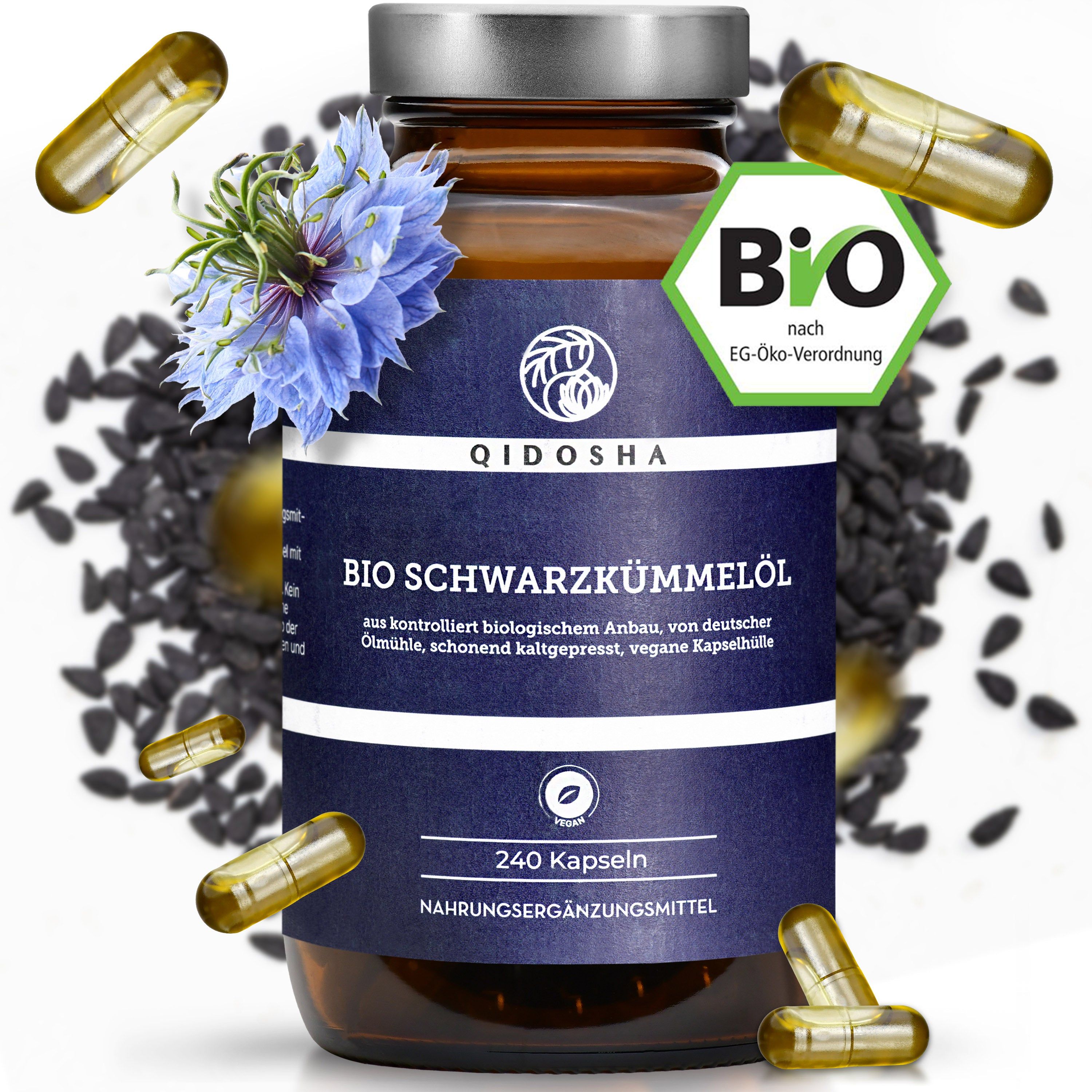 Braune Glasflasche mit blauem Etikett. QIDOSHA BIO SCHWARZKÜMMELÖL. 240 Kapseln. Bio-Siegel. Kapseln, Schwarzkümmel, Blume.