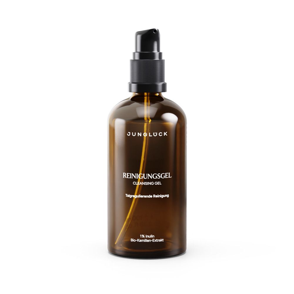 Braune Glasflasche mit schwarzem Pumpverschluss. Beschriftung: JUNGLÜCK, REINIGUNGSGEL, 1% Inulin, Bio-Karotten-Extrakt.