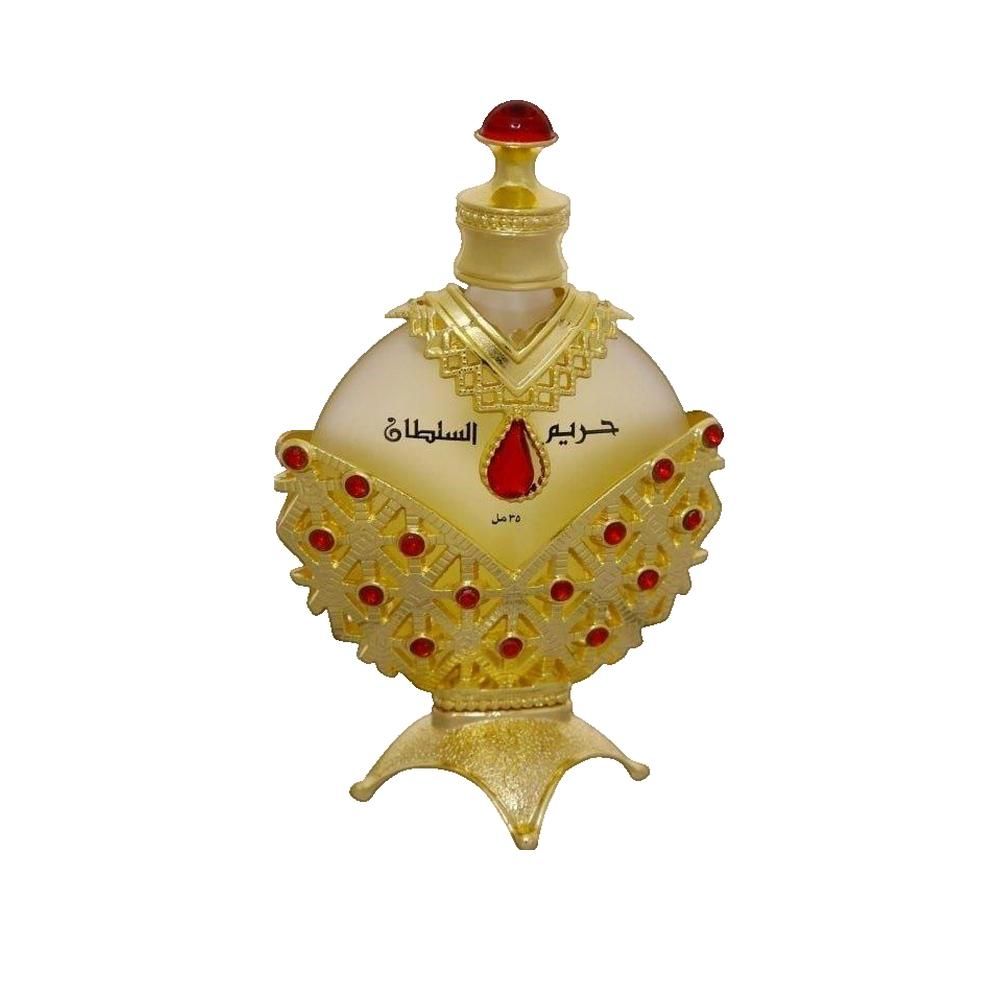 Goldfarbene Flasche mit rotem Schmuck. Aufschrift: HAREEM AL SULTAN. Konzentriertes Ölparfüm.