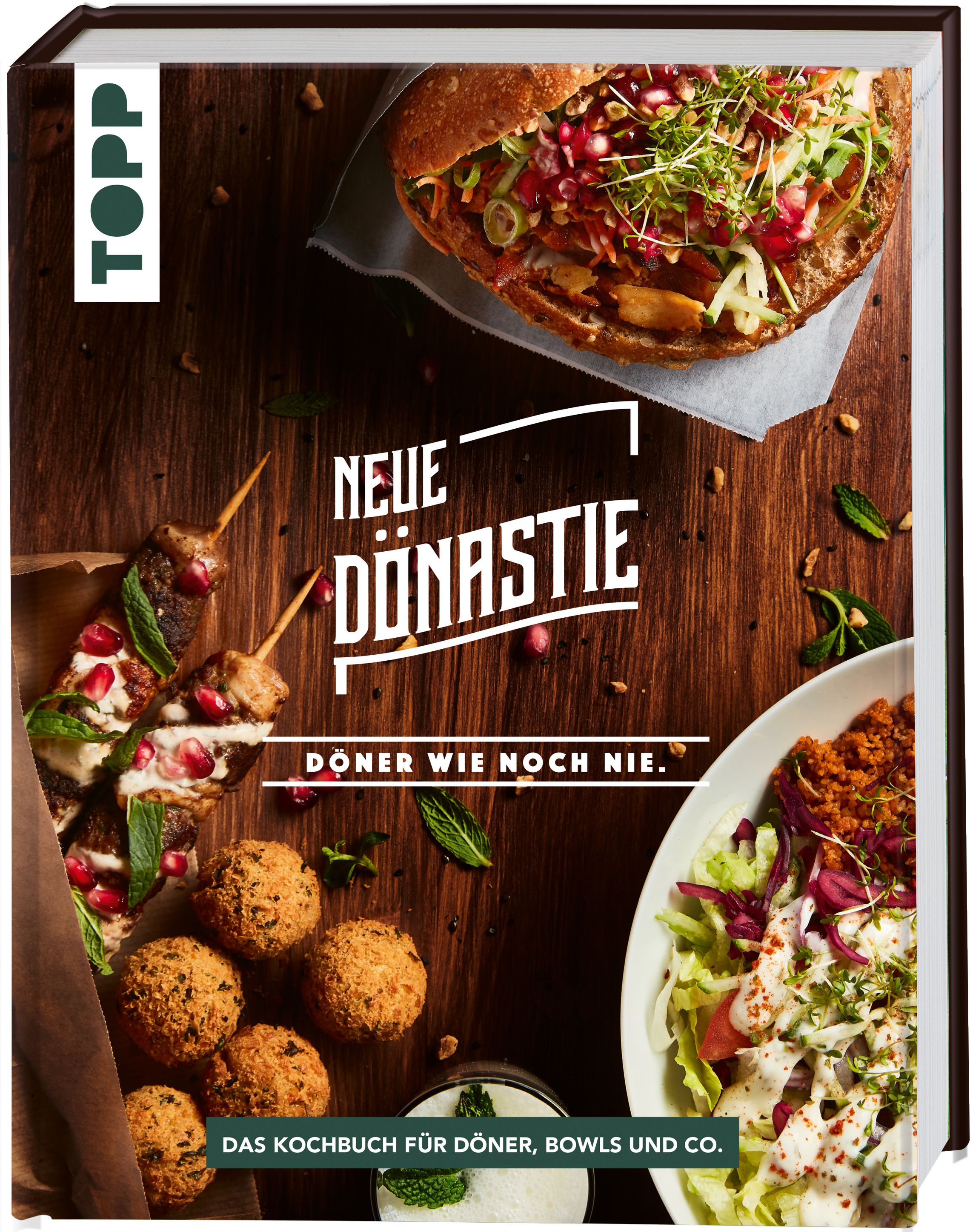 Kochbuch "Neue Dönastie" mit Döner-Gerichten. Auf dem Cover: Döner-Sandwich, Falafel, Salat. Logo "TOPP".
