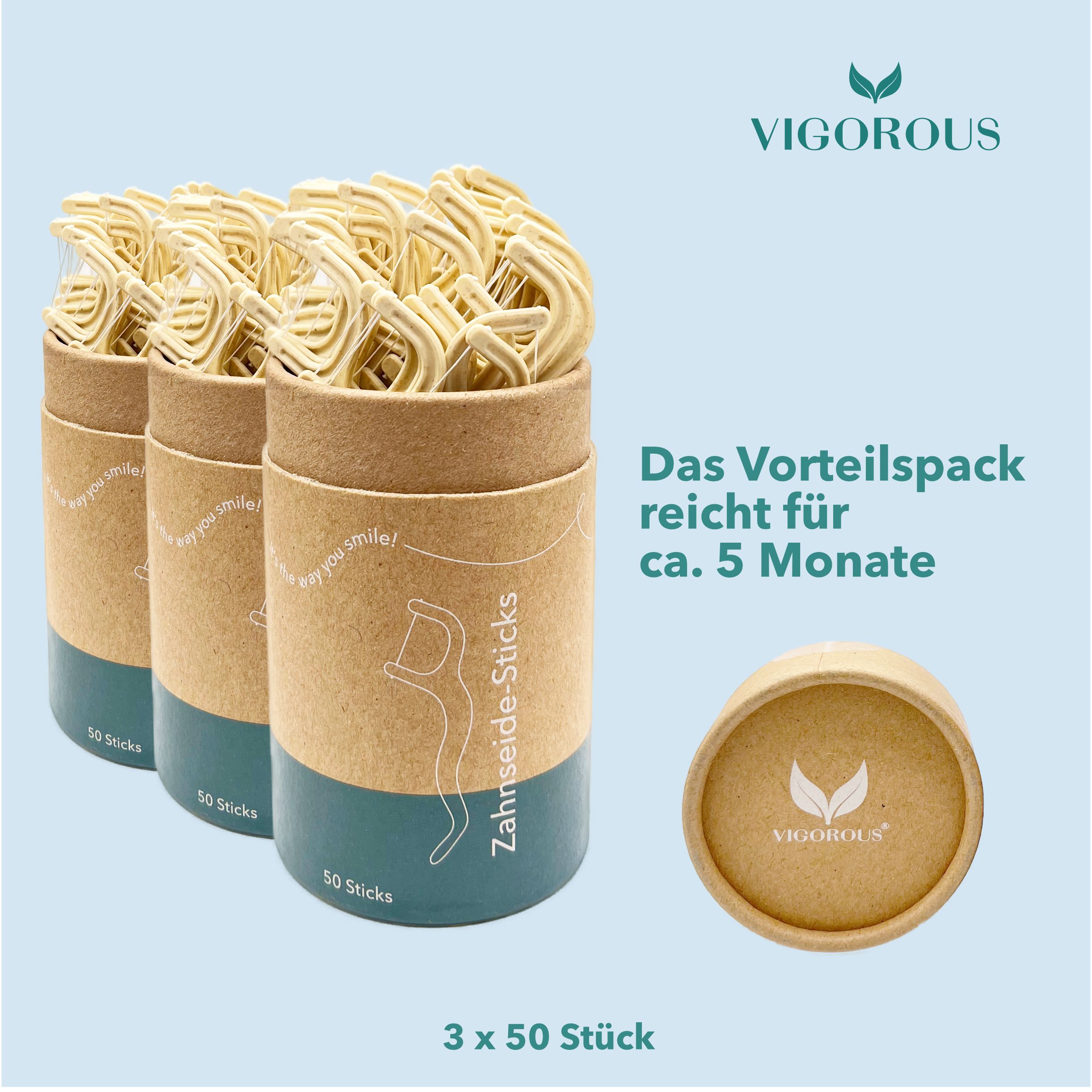Drei Behälter mit Zahnseide-Sticks. Aufschrift: VIGOROUS, Das Vorteilspack reicht für ca. 5 Monate, 3 x 50 Stück.