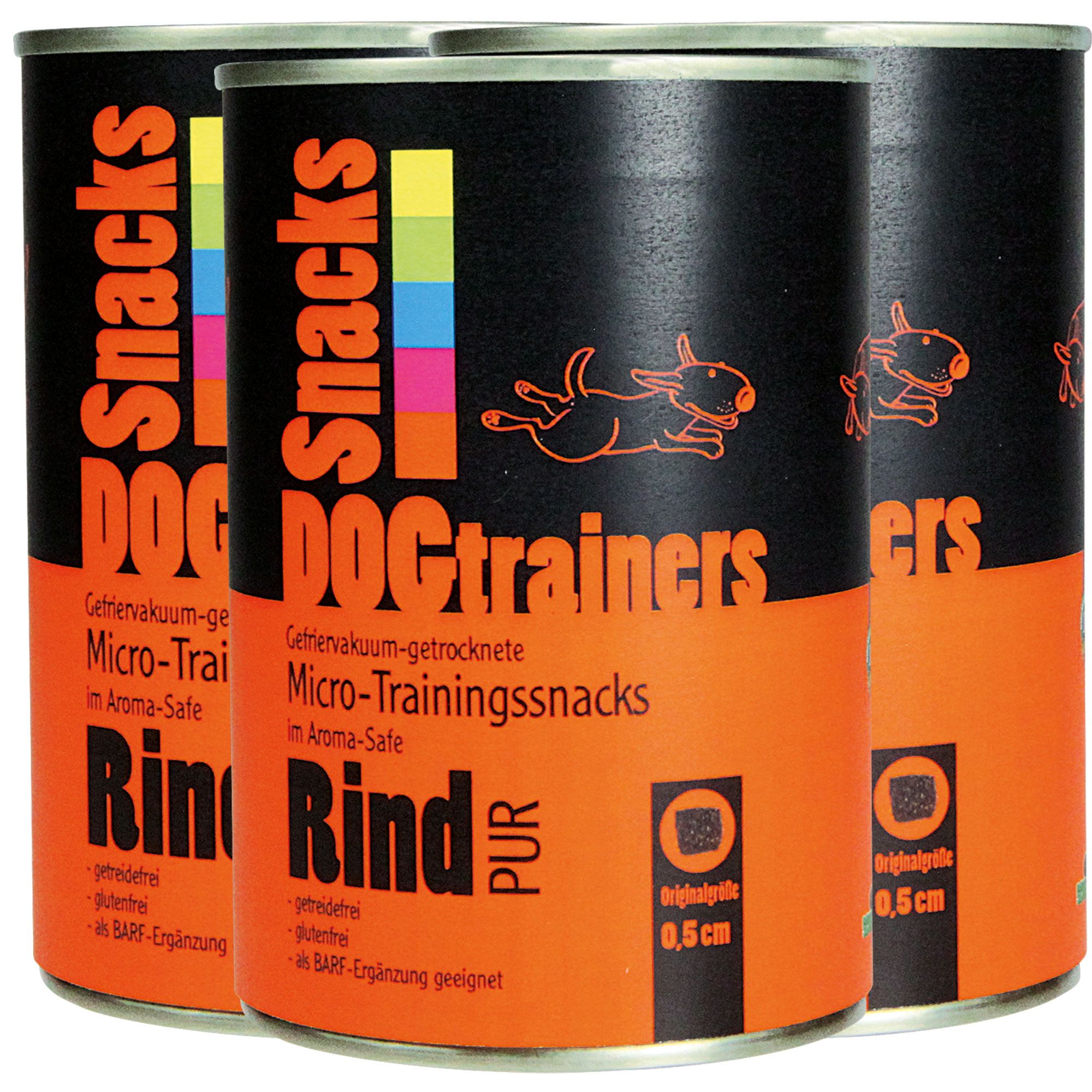 Drei Dosen DOGTRAINERS Rind PUR. Schwarze Dosen mit orangefarbenen Etiketten. Text: DOGTRAINERS Snacks, Rind PUR, getreidefrei, glutenfrei.
