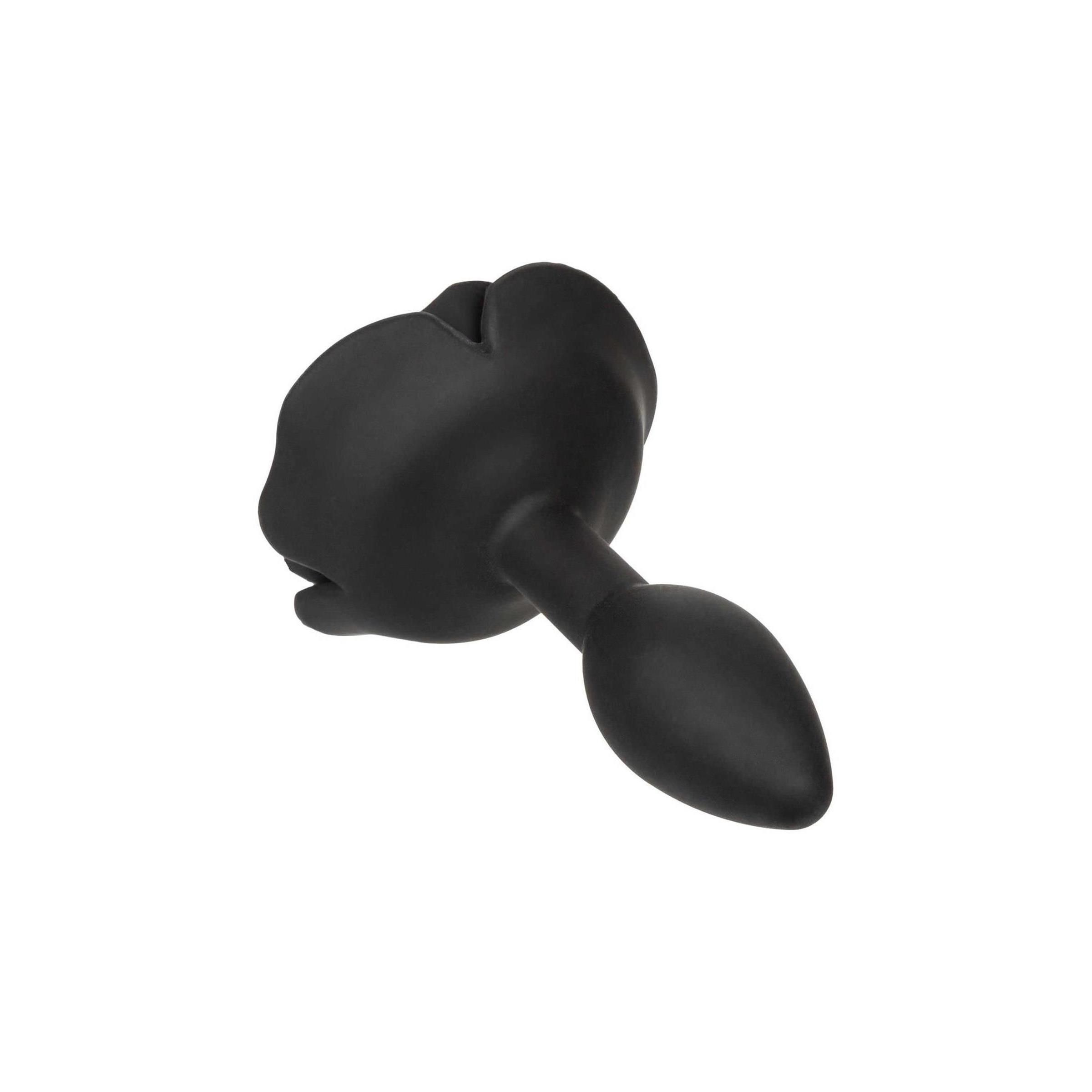 Schwarzer Anal Plug in Rosenform, leicht schräg von oben fotografiert.