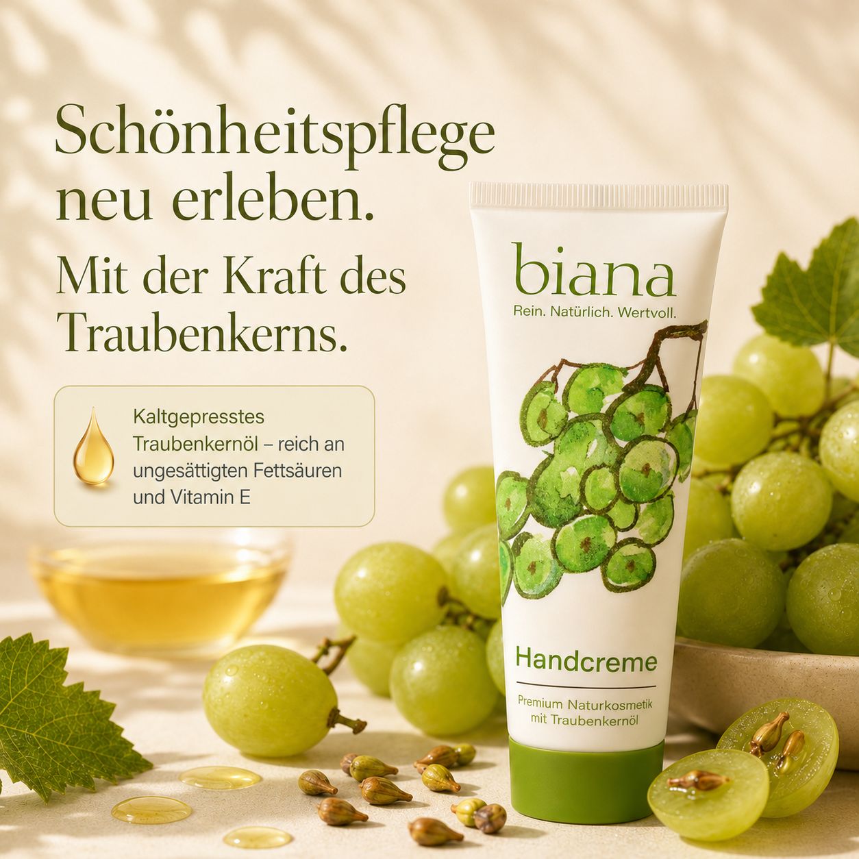 Biana Handcreme Tube neben grünen Trauben und Öl. Mit Traubenkernöl.