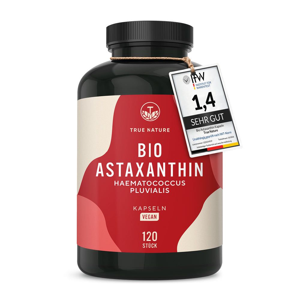 Dunkle Kapsel mit True Nature Bio Astaxanthin Aufdruck, 120 Stück, vegan. Mit Bewertungssiegel.