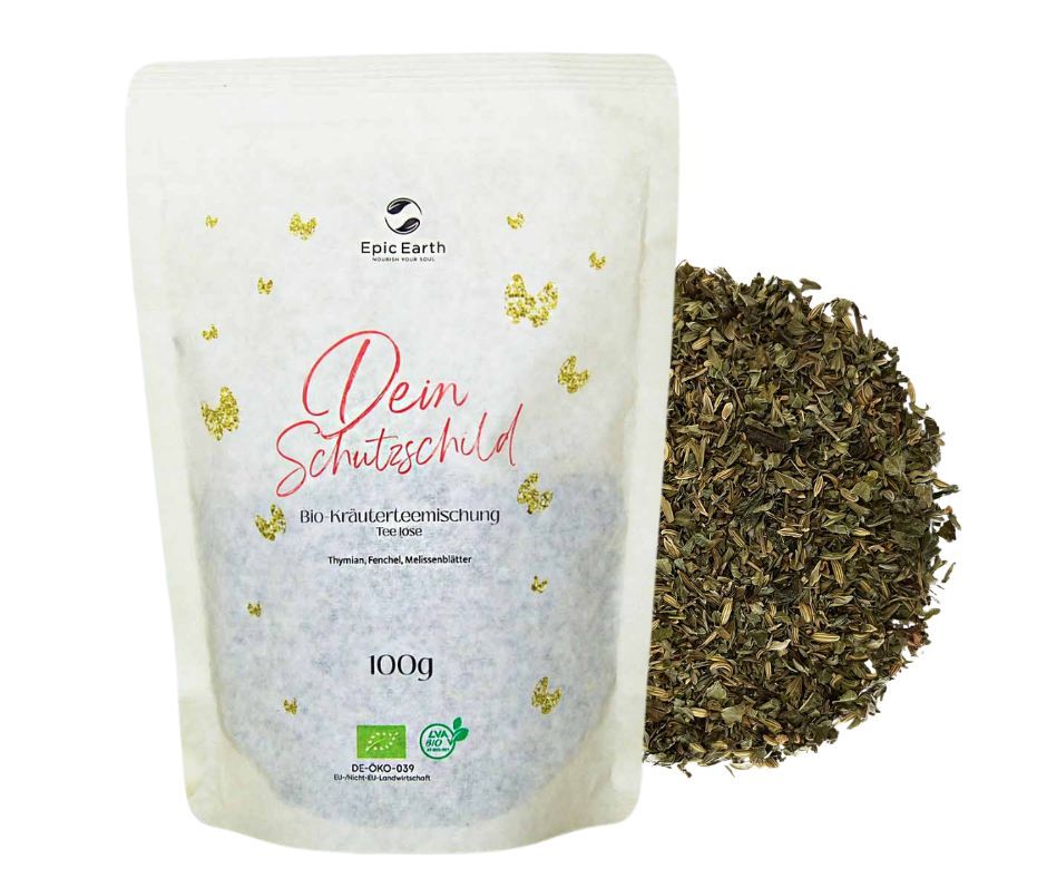 Beutel mit losem Tee und Haufen loser Kräuter. Aufschrift: Dein Schutzschild, Bio-Kräutermischung. 100g. EU-Bio-Logo.