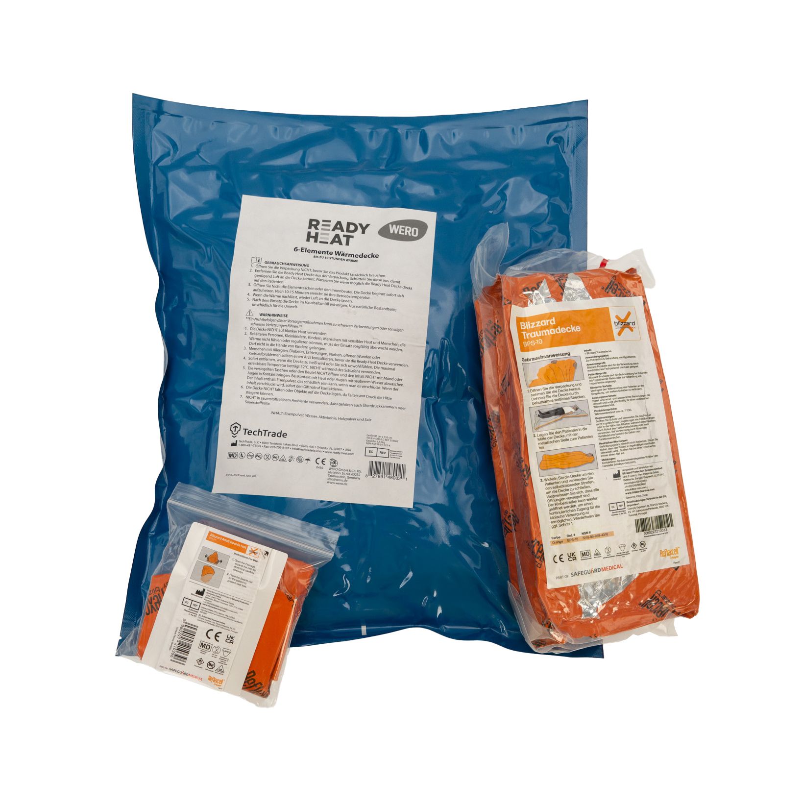 WERO MED-X® Hypothermie Professional Bundle. Mehrere orangefarbene Wärmeprodukte in Plastikverpackungen, blaue Tasche mit Anweisungen.