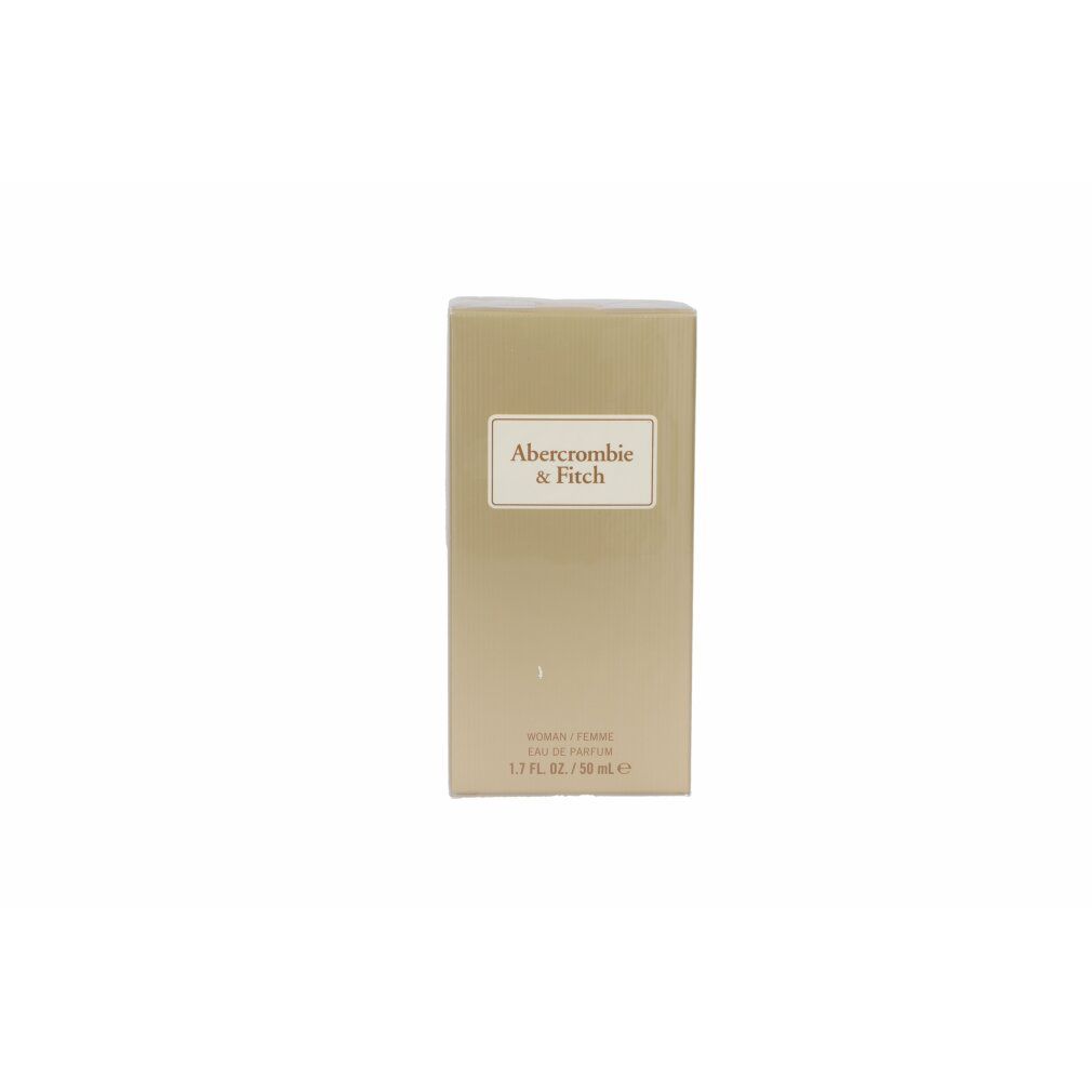 Goldfarbene Parfümverpackung mit Markenlogo. Text: Abercrombie & Fitch, Woman/Femme, Eau de Parfum, 1.7 FL. OZ./50 ml e.