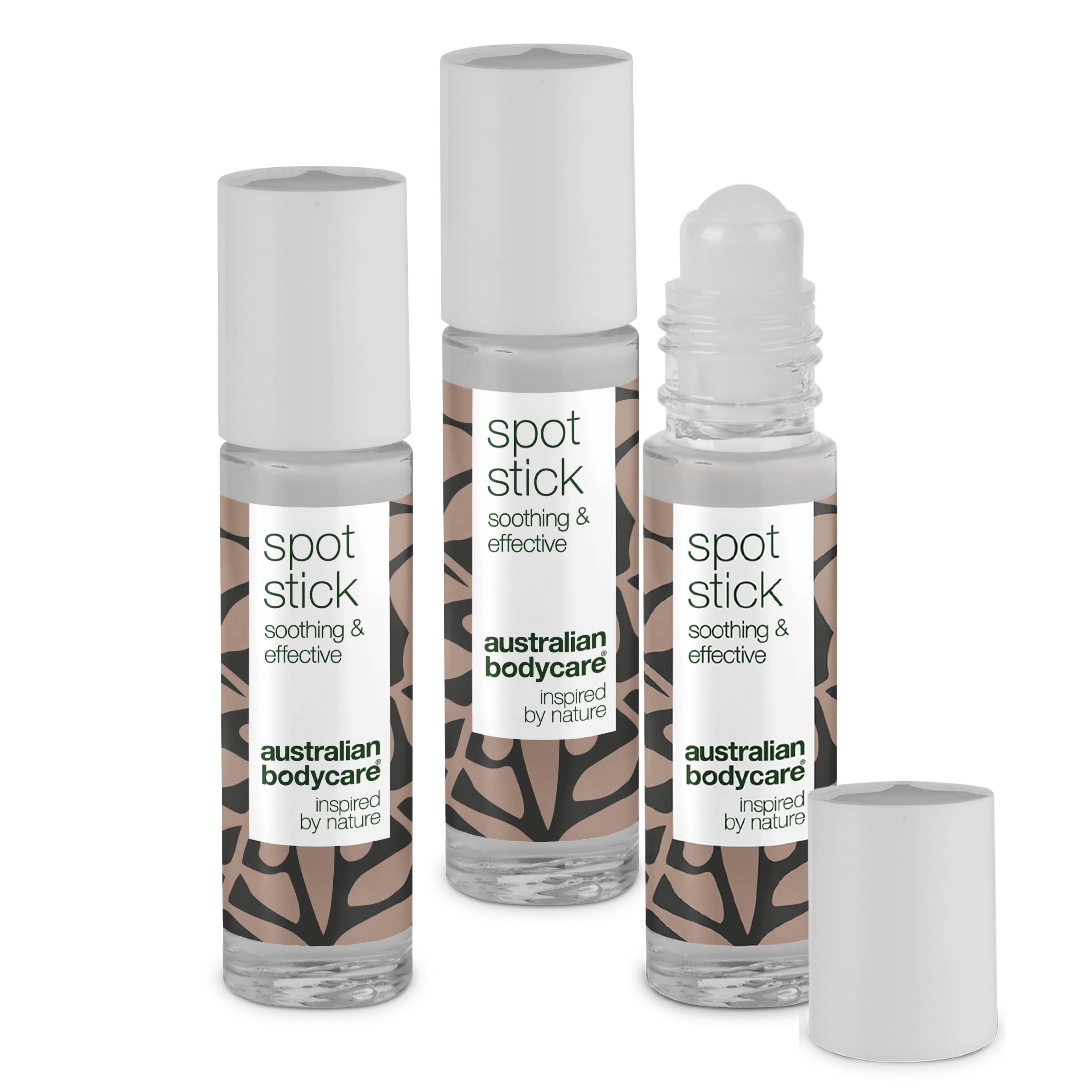 Drie Spot Stick-flessen met witte doppen. Opschrift: Spot Stick, Australian Bodycare.
