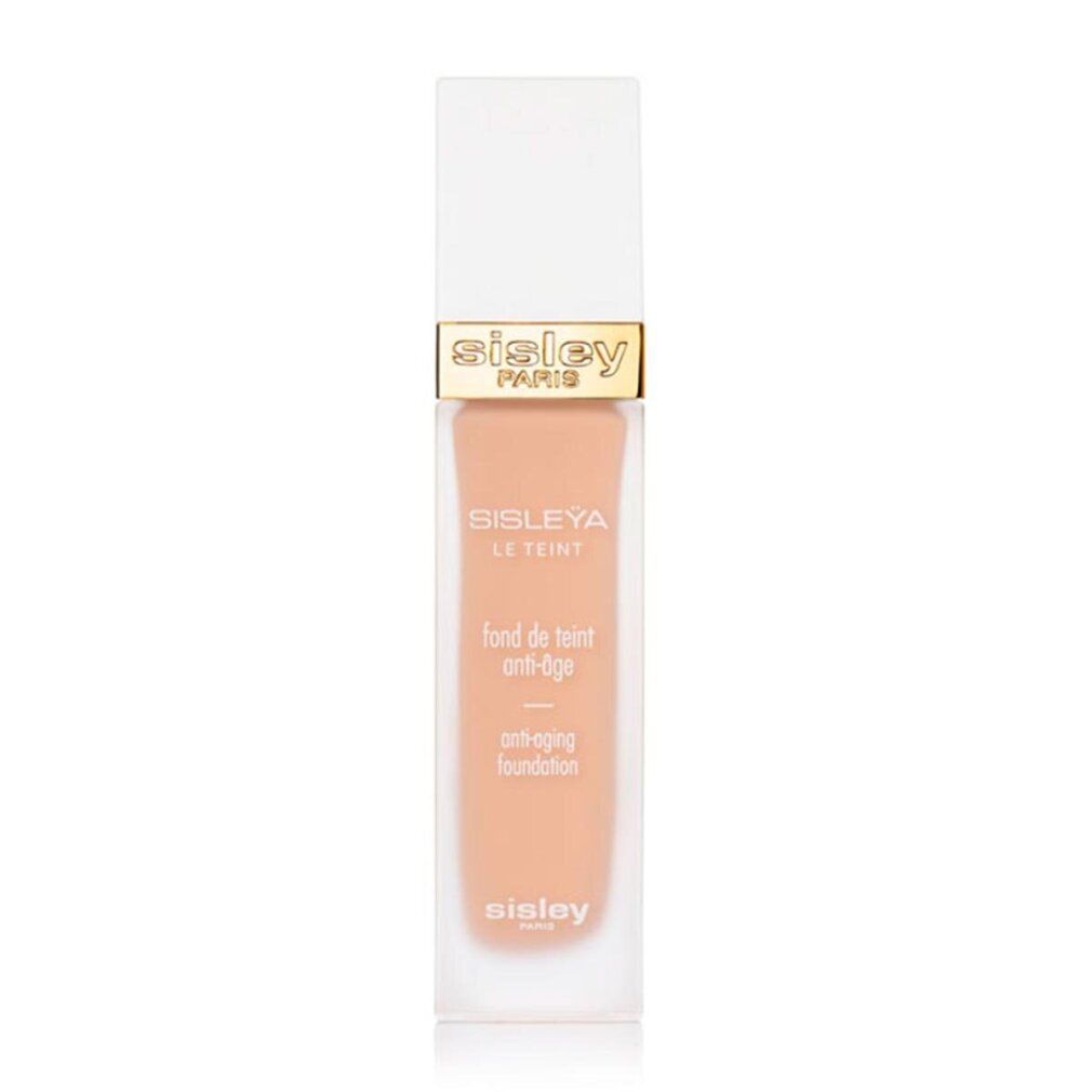 Sisley Sisleya Le Teint Foundation. Rechteckige Flasche mit weißem Deckel. Goldener Schriftzug Sisley Paris.