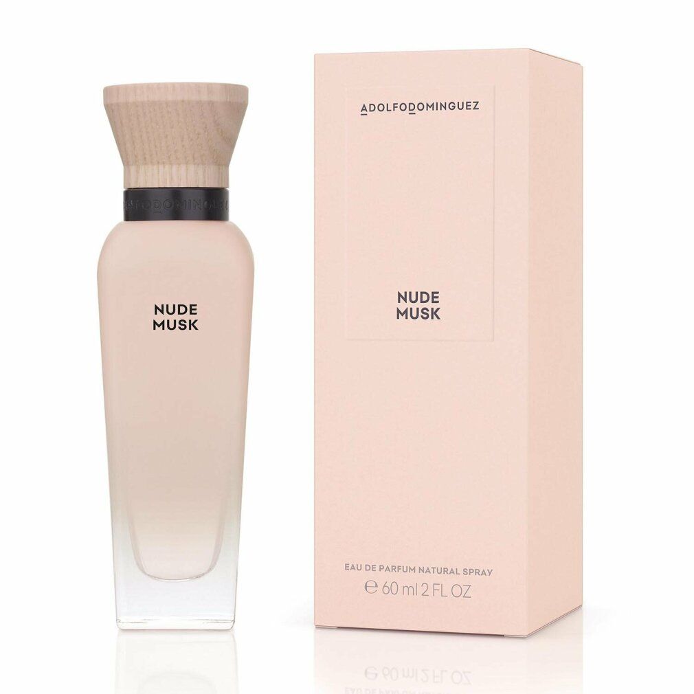 Parfümflasche und Verpackung. Flasche mit Holzdeckel, schwarzem Ring, rosa Flüssigkeit. Verpackung mit Logo und Produktname.