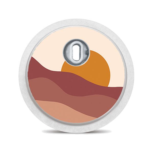 Runder Aufkleber mit Sonne und Berglandschaft. Beige, braune Farbtöne. Für medizinische Geräte.
