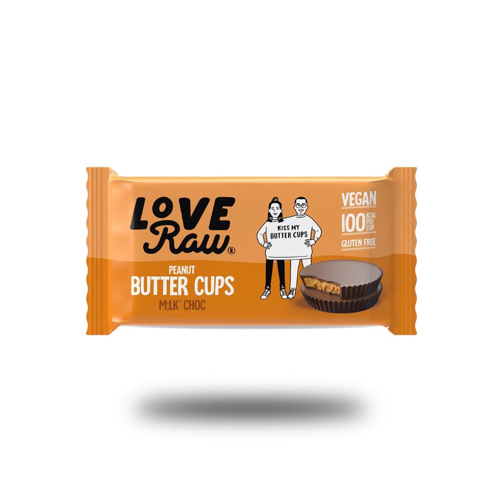 Verpackung von Love Raw Peanut Butter Cups. Orangefarbene Verpackung mit Logo, Illustration und Produktbezeichnung. Vegan und glutenfrei.