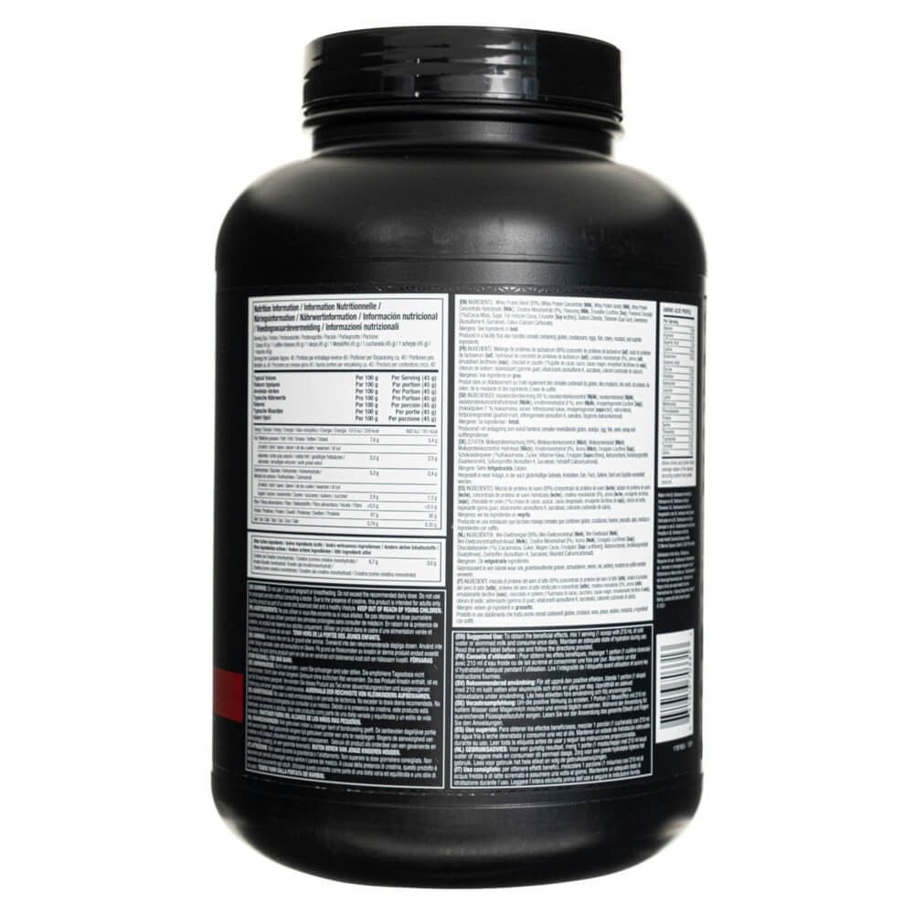 Rückseite eines schwarzen Behälters mit Muscletech Nitro-Tech Whey Protein. Enthält detaillierte Nährwertangaben und Informationen in mehreren Sprachen.