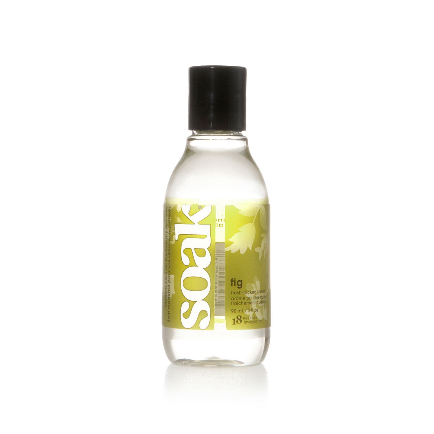 Klare Flasche mit schwarzem Deckel. Gelbes Etikett mit weißem "soak"-Schriftzug und "fig"-Aufdruck. 18 ml.
