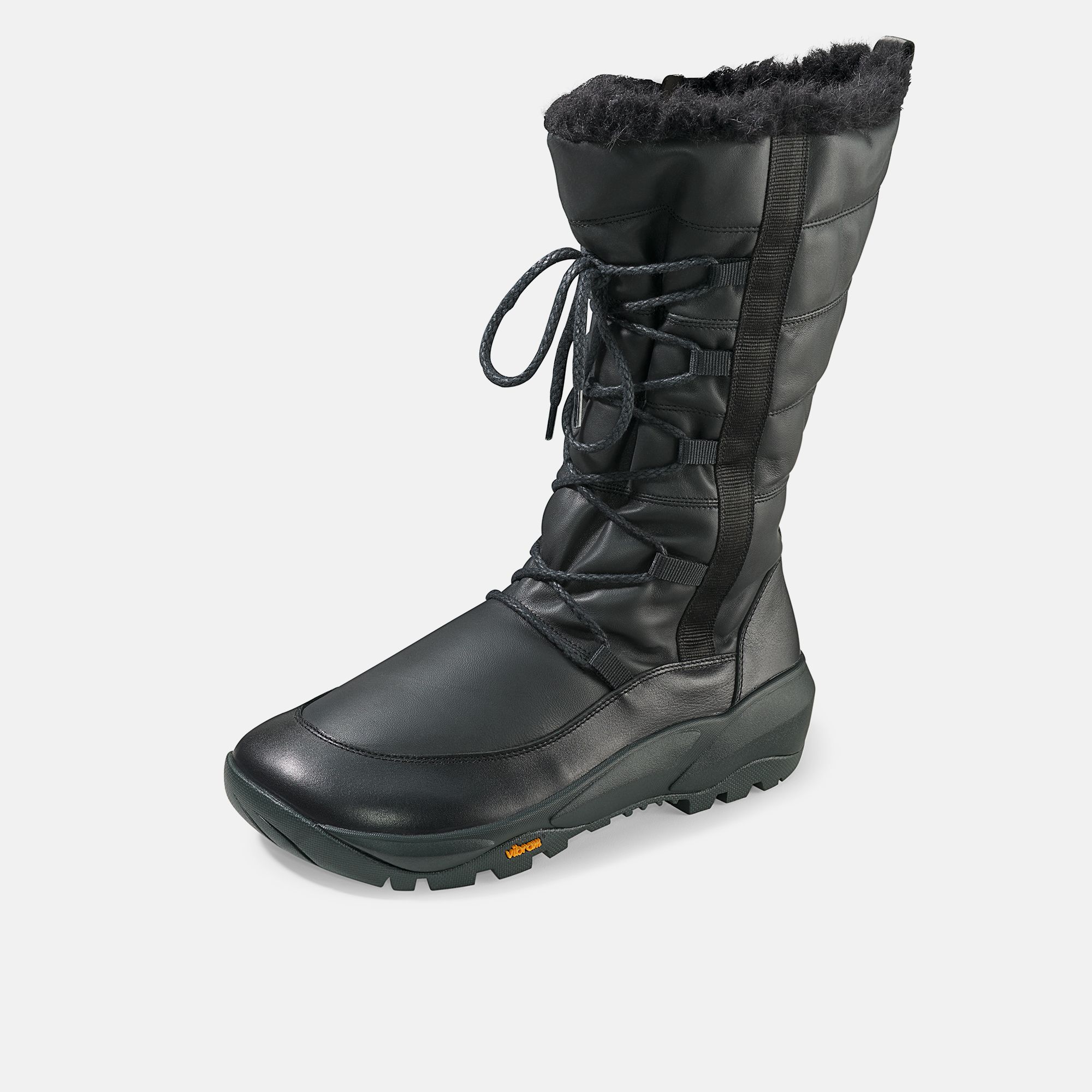 Schwarzer Stiefel mit Schnürung und Fellbesatz. Vibram-Sohle. Breite Ausführung.