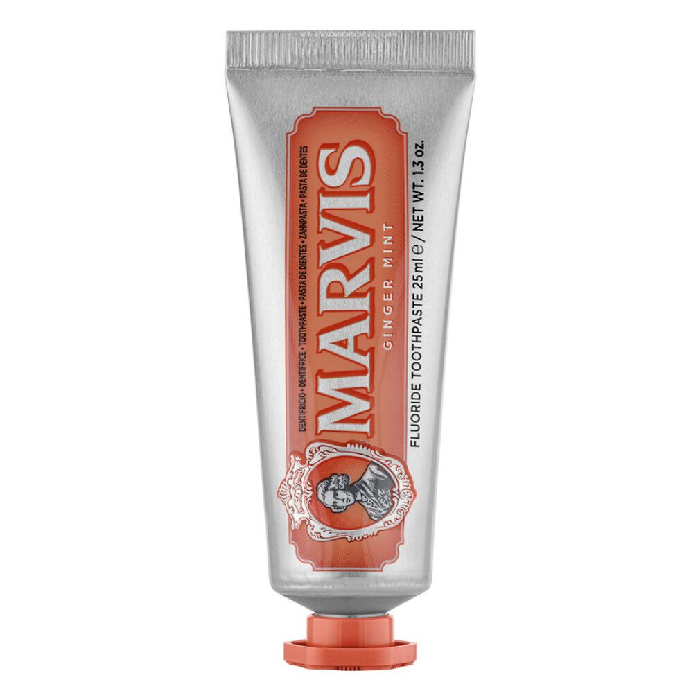 Zahnpasta-Tube. Silberfarben, orangefarbene Akzente. Aufschrift: MARVIS Ginger Mint. 25ml/1.3 oz.