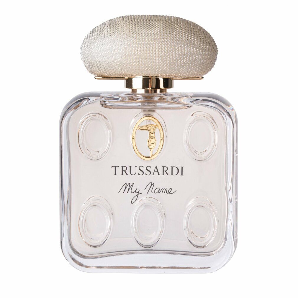 Quadratischer Flakon mit rosafarbenem Inhalt. Goldfarbener Verschluss. Aufschrift: Trussardi My Name.