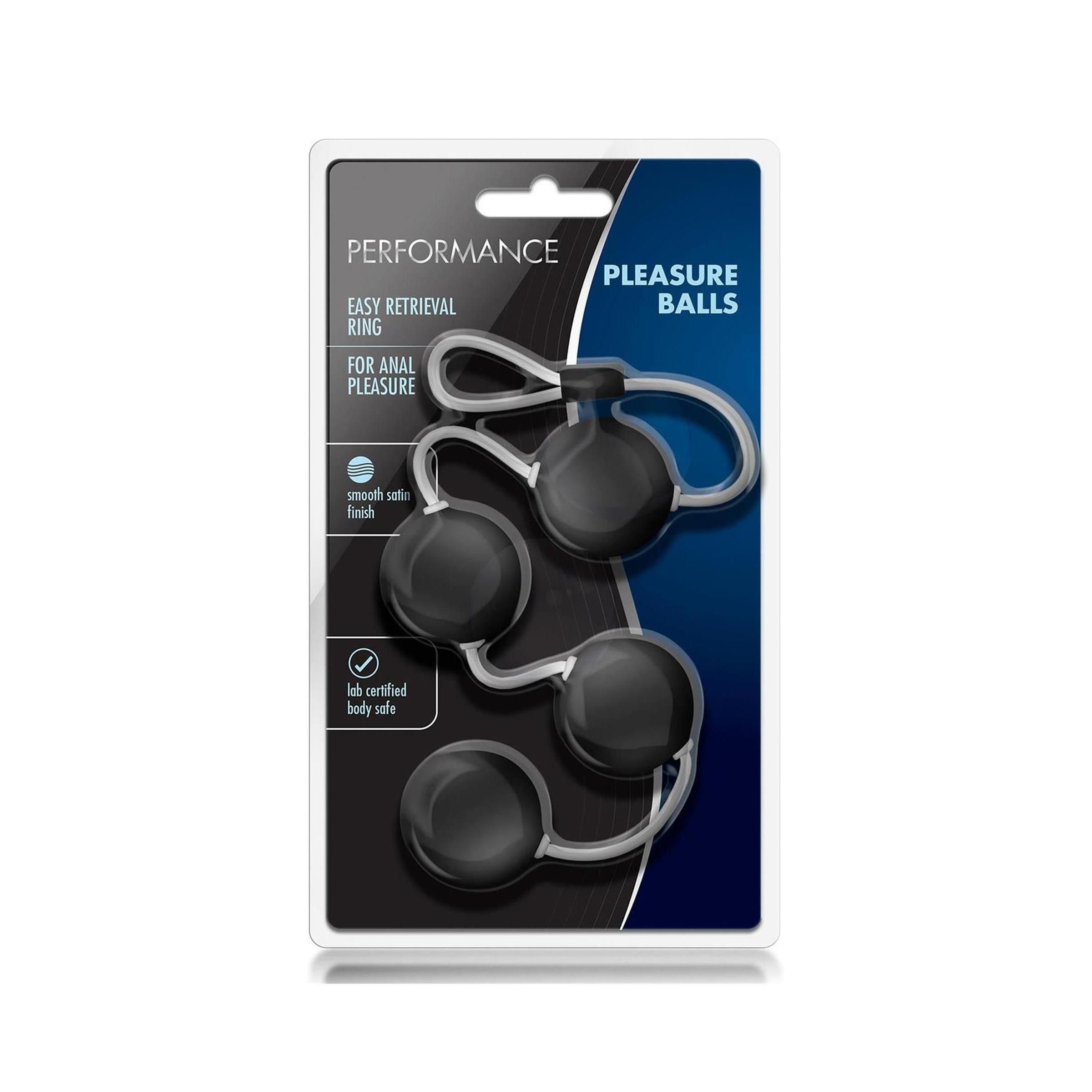 Verpackung mit schwarzen Kugeln und weißem Band. Text: PERFORMANCE, EASY RETRIEVAL RING, FOR ANAL PLEASURE, smooth satin finish, lab certified body safe.