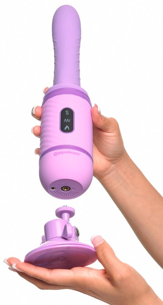 Lila Wellness-Produkt mit Saugnapf. Zylindrischer Körper, abgerundete Spitze. Produkt wird von Händen gehalten.